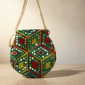 Green embroidered mirror work potli bag