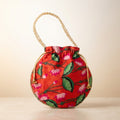 Red floral print potli bag Mobcos