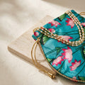 Blue floral potli bag with drawstring