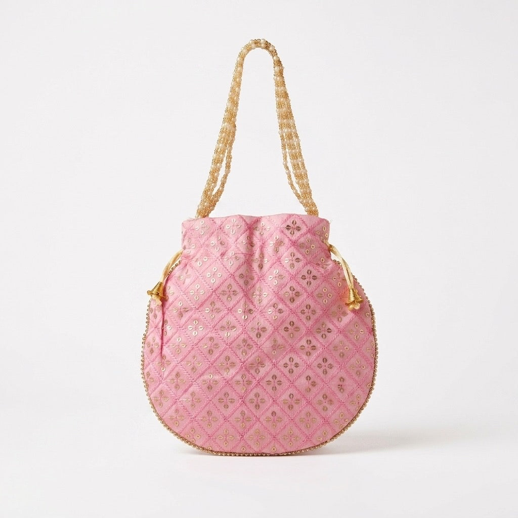 Pink mirror work potli bag ethnic accessory