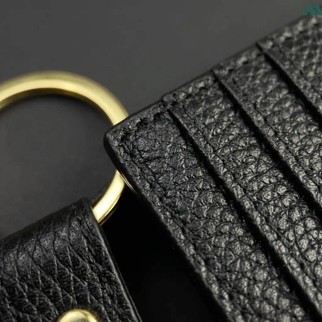 Black card holder holding cards