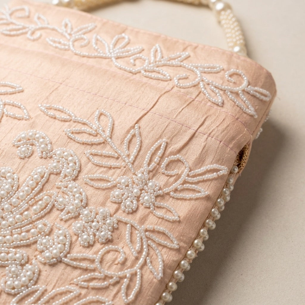 Beige mirror work potli embroidery detail