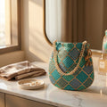 Blue embroidered mirror work potli bag