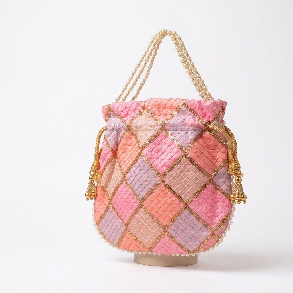 Light pink mirror work potli embroidery detail