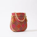 Orange mirror work potli bag ethnic accessory