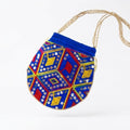 Dark blue mirror work potli embroidery detail