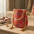 Handcrafted Indian mirror work potli bag orange