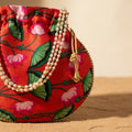 Red floral potli pouch drawstring closure
